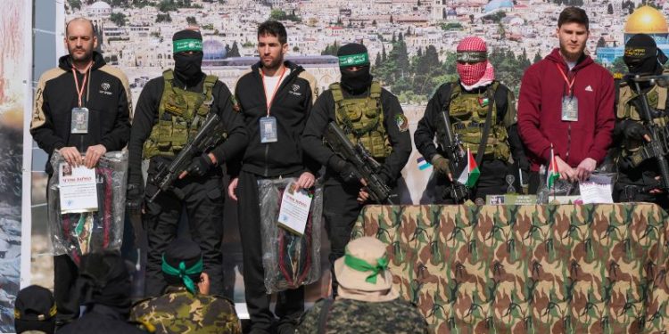 Three Israeli hostages freed after dispute threatened Gaza ceasefire