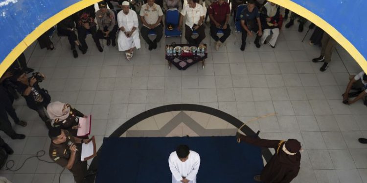 Two men publicly caned for having sex with each other in Indonesia’s conservative Aceh