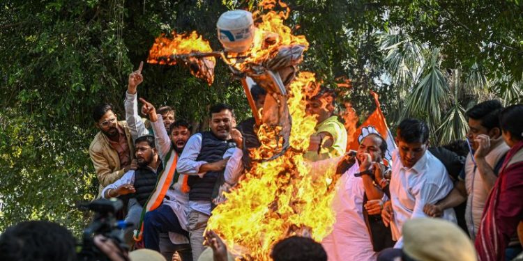 ‘Treated like criminals’: Shackling of Indians aboard 40-hour migrant flight sparks new outrage against Trump