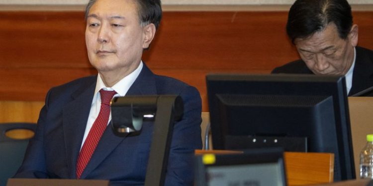 South Korea’s Yoon attends first trial hearing for insurrection