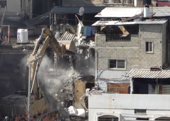 Israel demolishes West Bank apartment buildings as military campaign displaces tens of thousands of Palestinians