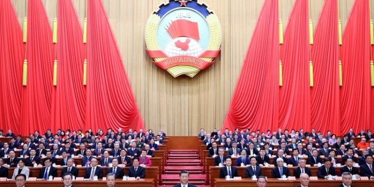 As Trump upends US government, Xi aims to project that it’s business as usual in China