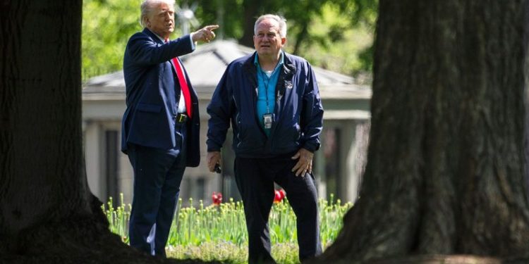 Trump unfurls plans for double 100-foot flagpoles during White House lawn walk
