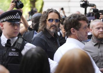 Russell Brand arrives at London court to face sexual assault charges