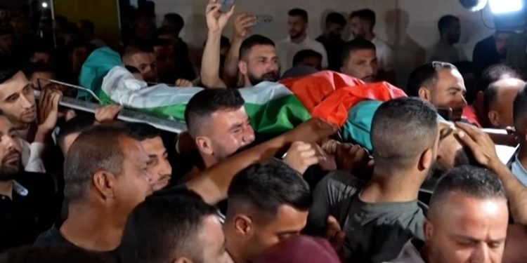 Israeli forces kill 15-year-old Palestinian boy after settlers attack West Bank towns, officials say