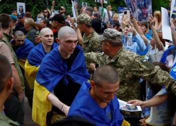 Soldiers return home after years in captivity as Ukraine-Russia prisoner swap begins