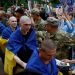 Soldiers return home after years in captivity as Ukraine-Russia prisoner swap begins