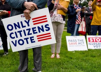 Why DOJ is caught up in two dozen court fights over voter rolls